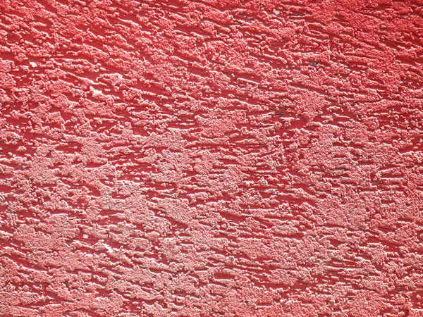 Красный Текстурированный Фон Стены Ярким Солнечным Светом — стоковое фото