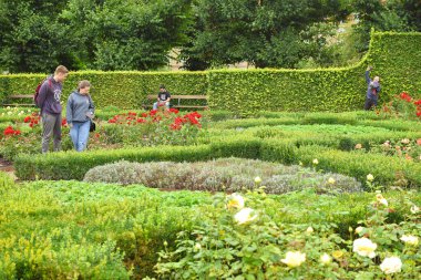 Copenhagen, Denmark. October 19, 2024. Beautiful garden with tourists in Rosenborg Slot, Copenhagen. clipart