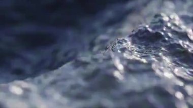 Close-up sea or ocean waves splashing, slow motion seamless dark water surface, shallow depth of field, bokeh. 3d animation.