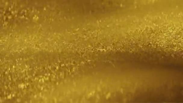 Błyszczący Złoty Piasek Faliste Tekstury Błyszczące Złote Cząsteczki Musujące Luksus — Wideo stockowe