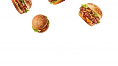 Hamburgerler yavaş çekimde beyaz arka plana düşüyor. 4k ProRes animasyon görüntüleri.