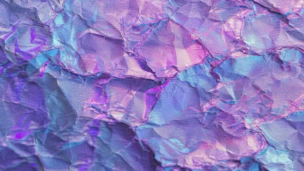 Iridescent Crumpled Paper Streszczenie Fioletowymi Niebieskimi Odcieniami Zatrzymaj Efekt Ruchu — Wideo stockowe