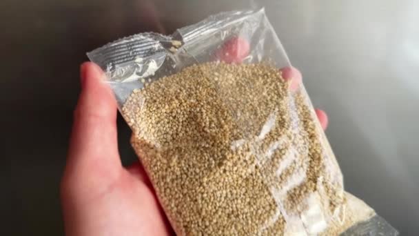 Raw Quinoa Seeds Plastic Package Super Food Gluten Free Concept — Stock Video