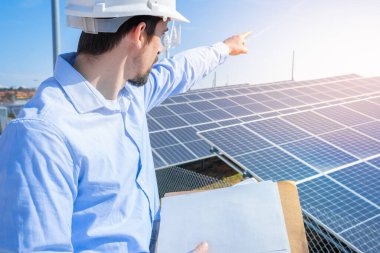 Solar panels clean green energy power. Engineer install and maintenance the solar cell. Technician checks the equipment of renewable electrician. High quality photo