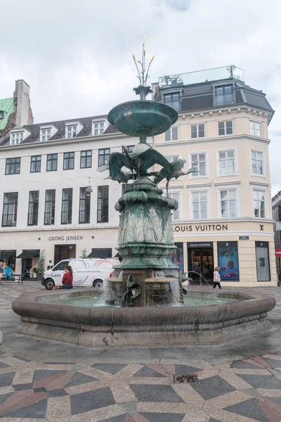 stock image Copenhagen, Denmark - July 26, 2022: The Stork Fountain on Stroget street.