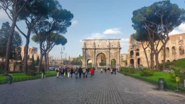 Rome, Italy - December 7, 2022: Arch of Constantine (Arco di Costantino). Triumphal arch in Rome dedicated to the emperor Constantine.