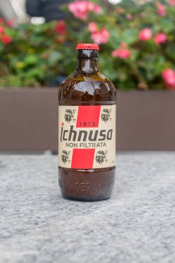 Bergamo, Italy - September 30, 2022: Ichnusa Non Filtrata beer. clipart