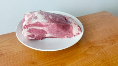 Pork boston butt, raw piece of pork neck.