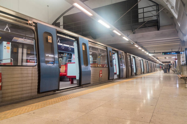 Lisbon, Portugal - December 6, 2022: Metro train on metro station in Lisbon.