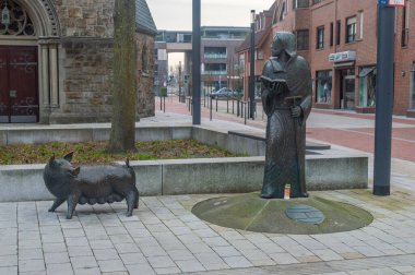 Gronau, Germany - March 10, 2024: The St. Antonius with pig sculpture. clipart