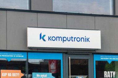 Lodz, Poland - April 14, 2024: Logo and sign of Komputronik store. clipart