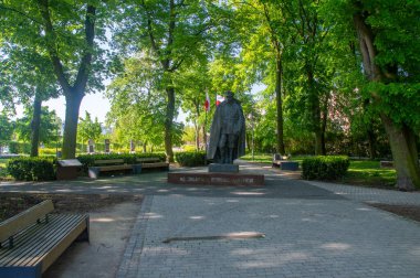 Jarocin, Poland - May 1, 2024: Sculpture of Zbigniew Ostrorog Gorzenski. clipart