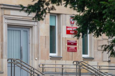 Warsaw, Poland - June 22, 2024: Entrance to National Police Headquarters (Komenda Glowna Policji) in Poland. clipart