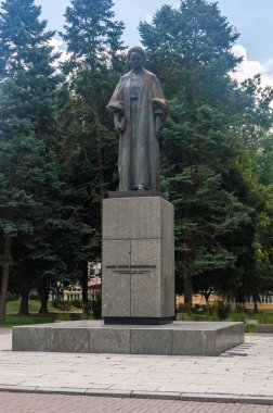 Lublin, Poland - August 10, 2024: Sculpture of famous Polish and naturalised-French physicist and chemist Maria Salomea Sklodowska-Curie. clipart