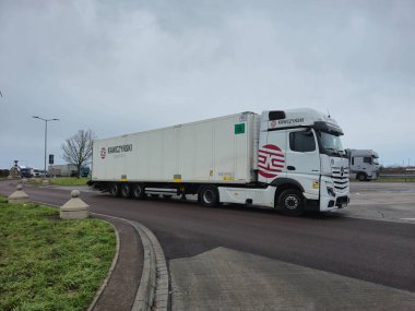 Borde, Germany - January 6, 2025: Kawczynski Logistics truck with cooling trailer.