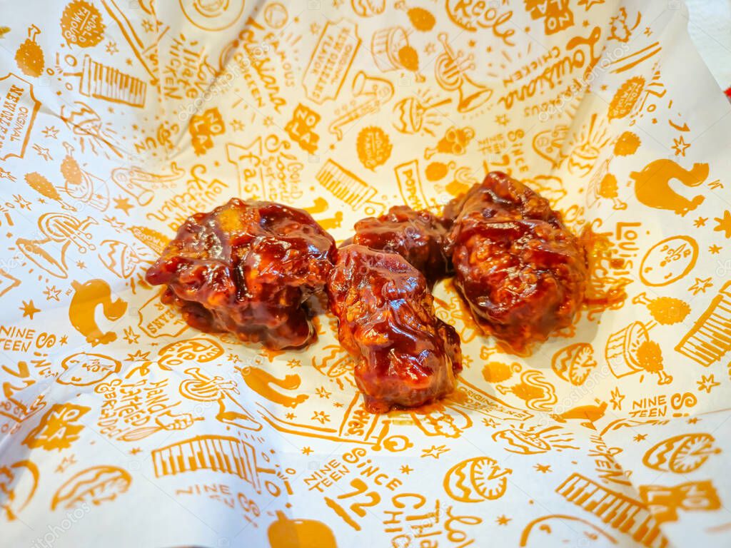 Wroclaw, Poland - April 5, 2025: Popeyes 3 bold BBQ fillet Nuggets.