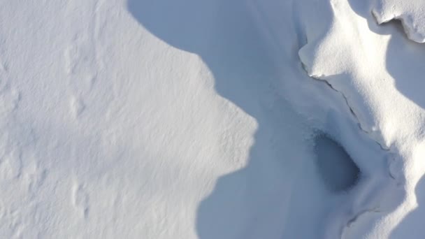 Aerial Drone Top Flying Low Snow Drifts Lake Michigan Cold — Video
