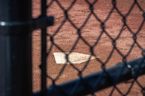 Close White Baseball Home Plate Base Black Chain Link Fence — Stock Photo, Image