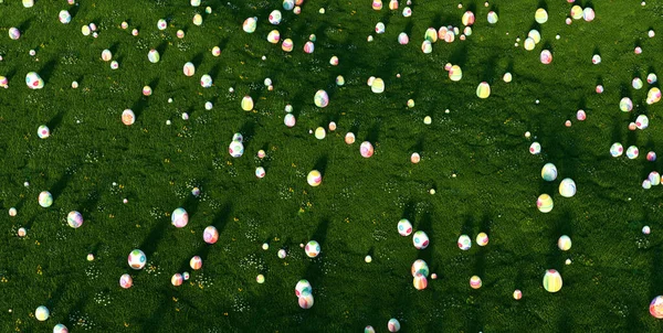 许多五彩缤纷的复活节彩蛋在草地上的草地上做为复活节彩蛋 — 图库照片