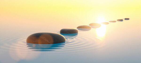 Row of stones in calm water in the wide ocean, meditation, zen and feng shui concept image