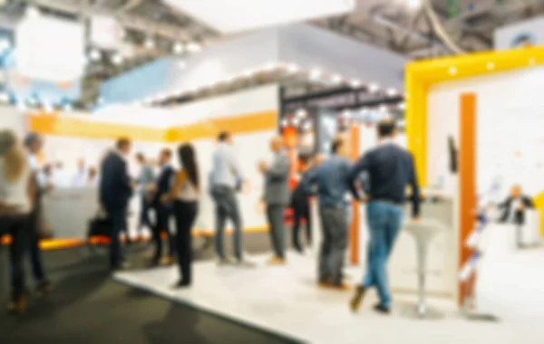Intentionally blurred public event exhibition hall, business trade show concept