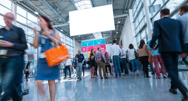 stock image Abstract Image of Business People Walking on a tradefair