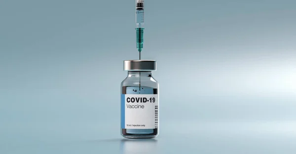 stock image COVID-19 Coronavirus mRNA Vaccine and Syringe with blank label for individual text. Concept Image for SARS cov 2 infection pandemic