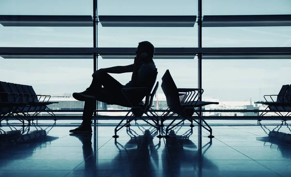 stock image businessman waiting for the flight