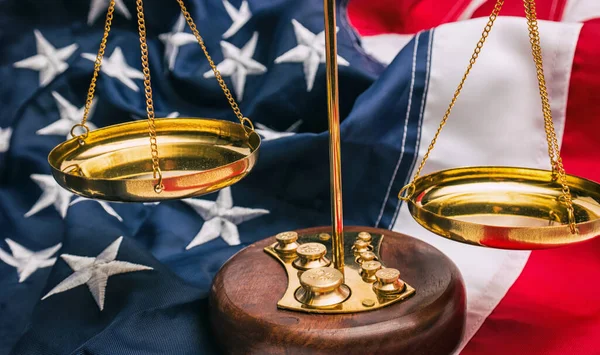 stock image Justicce scale with America flag - law concept image