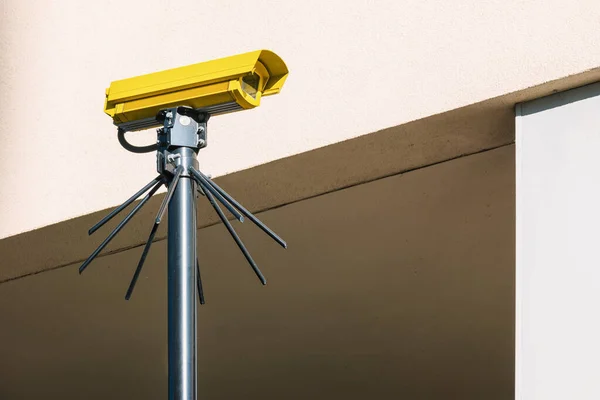 IP CCTV camera in Yellow color install by have water proof cover to protect camera with home security system concept image