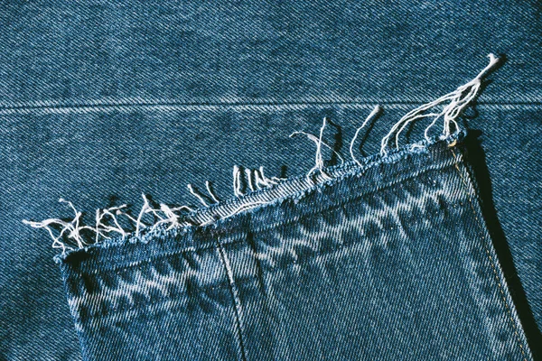 蓝色牛仔裤斜纹织物的细部 — 图库照片