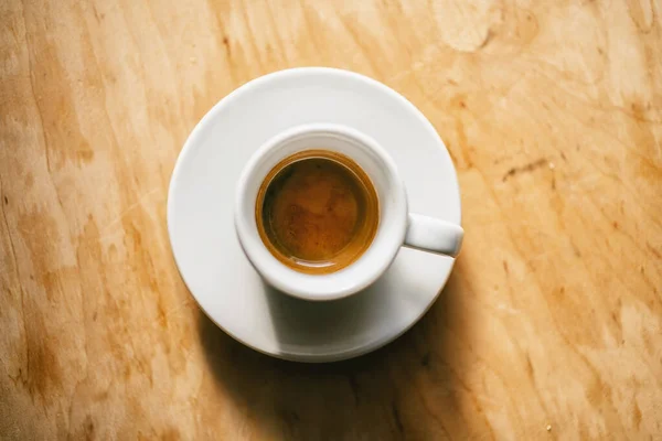 Filiżanka Kawy Espresso Drewnianym Tle Stołu Widok Góry Strzał — Zdjęcie stockowe