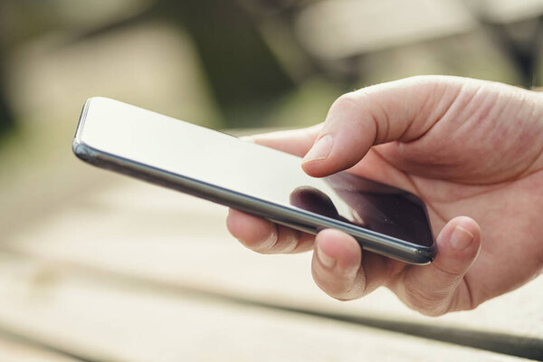 man using mobile smart phone