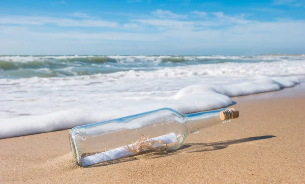 bottle with a message at the beach
