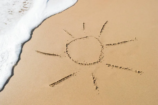 stock image Sun drawn on the sand 