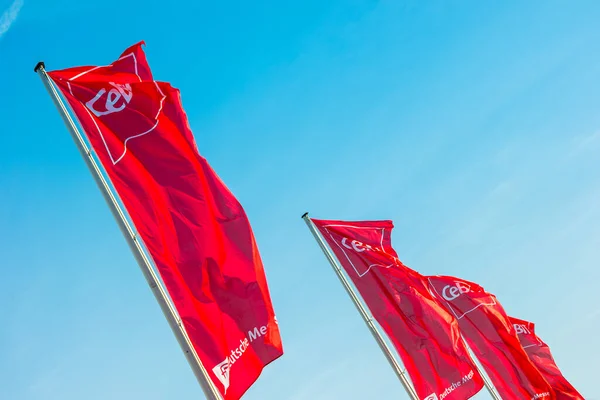 stock image HANNOVER, GERMANY MARCH, 2017: Cebit logo on flags against blue sky. The Cebit is the biggest trade fair for information technology in the world.