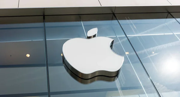 stock image FRANKFURT, GERMANY MARCH, 2017: Apple Logo on a store. Apple is the multinational technology company headquartered in Cupertino, California and sells consumer electronics products.