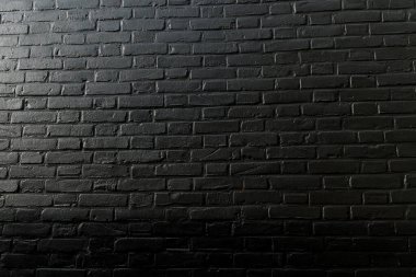 Siyah tuğla duvarın yatay kısmı