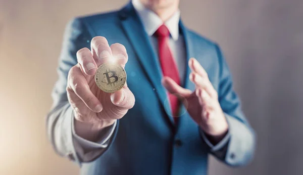 Businessman offers bitcoin - bit coin BTC the new virtual money