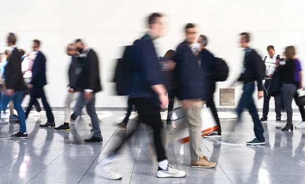 stock image Crowd of many anonymous blurred people on trade fair or shopping