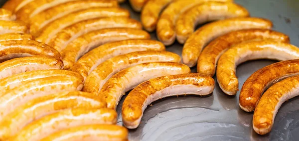 Many Currywurst Sausages Fried Frying Plate — Stock Photo, Image