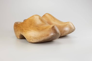 Pair of vintage wooden Dutch clogs in studio