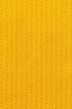 Sarı renk spor giysileri futbol gömleği forma desen ve tekstil arka plan.