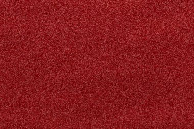 Kırmızı deri ve dokulu bir arka plan..