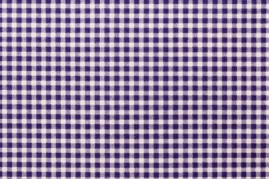 Close-up plaid fabric pattern texture and textile background.