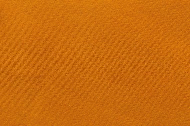 Turuncu renkli kumaş kumaş kumaş polyester doku ve tekstil arkaplan.