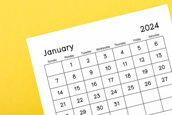 2024日历台 1月是组织者计划和截止日期的月份 背景为黄色 — 图库照片