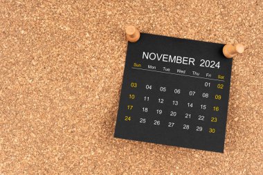 Tahta raptiyeli Kasım 2024 siyah takvim sayfası.