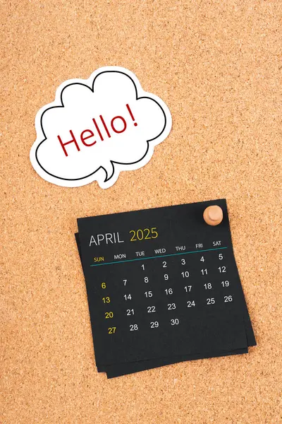 April 2025 Black Calendar Page Hello Text Thumbtack Wooden Board — Stock Photo, Image