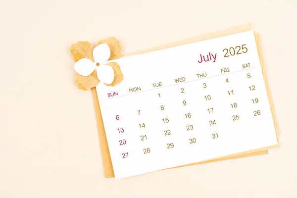 July 2025 Calendar Origami Flower Paper Beige Color Background — Stock Photo, Image